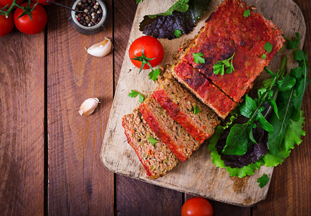 Homemade ground meatloaf with vegetables. Top viewの写真素材