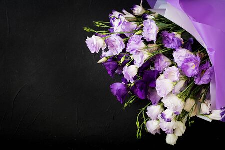 Beautiful flowers bouquet mix of white, purple and violet eustoma.の写真素材