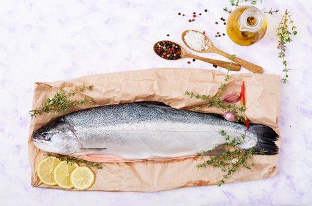 Fresh raw salmon red fish  on a light  background. Flat lay. Top viewの写真素材