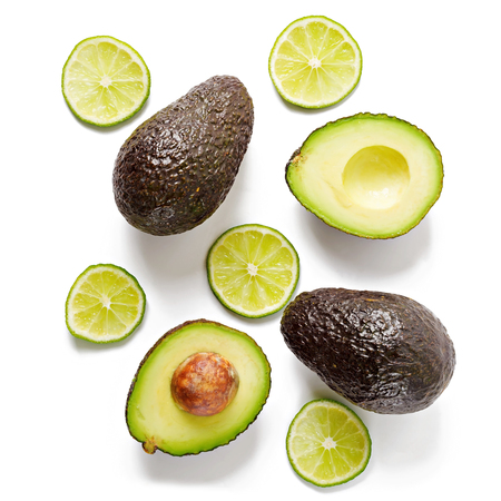 Avocado and lime isolated on white background. Top viewの写真素材