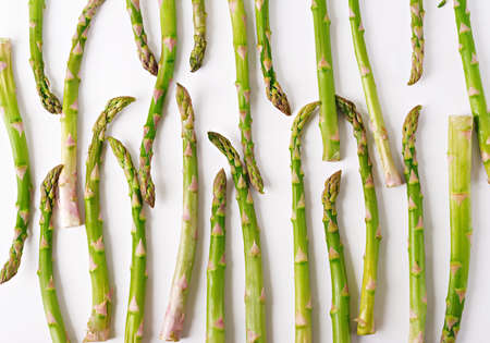 Background from isolated on white background asparagus. Top viewの写真素材