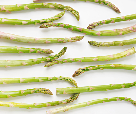 Background from isolated on white background asparagus. Top viewの写真素材