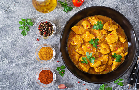 Curry with chicken and onions. Indian food. Asian cuisine. Top viewの写真素材