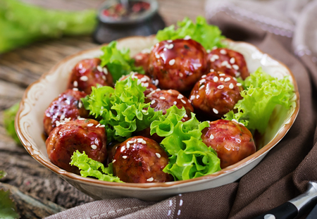 Meatballs with beef in sweet and sour sauce. Asian food.の写真素材
