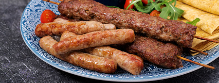 Turkish and Arabic Traditional Ramadan mix kebab plate. Kebab adana, lamb and beef on lavash bread...