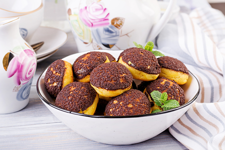 Shu Cake. Tasty profiterole with cream on the plate. Copy spaceの写真素材