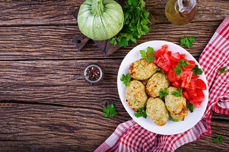 Chicken cutlet with zucchini and tomatoes salad. Healthy food. Top viewの写真素材