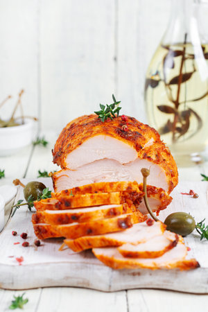 Chicken pastrami with red paprika and red pepper. Meat delicacy. Diet food.の写真素材
