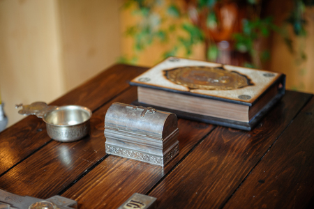 cross and bible on the wooden tableの写真素材