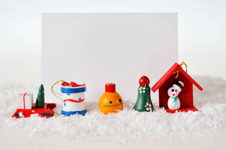 Christmas card with  Christmas tree, house, sweetsの写真素材