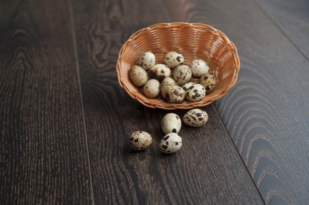 Easter eggs in a beautiful wicker basket.の写真素材