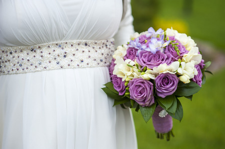 Wedding bouquet in hands of the bride.の写真素材
