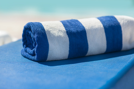 towel on a sun lounger on the beach.の写真素材