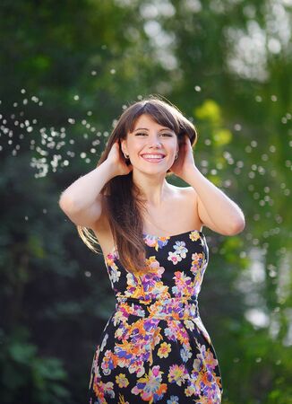 portrait of happy girl in the park.の写真素材