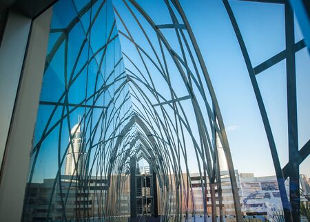 perspective reflected in the glass building.の写真素材