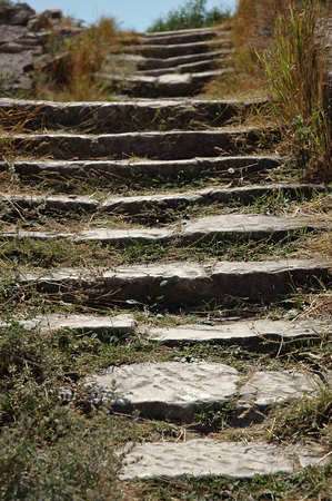 stone steps overgrown with grass.の写真素材