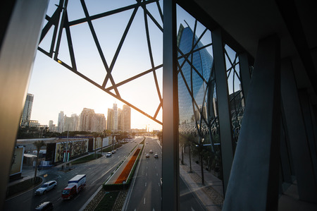 Dubai, UAE road and skyscrapers on the setting sunの写真素材