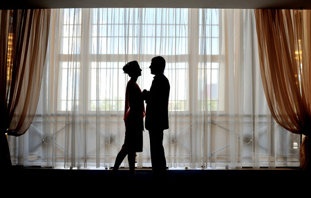 silhouette of man and woman.の写真素材