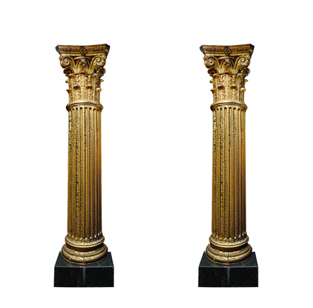 two gold columns isolated on white background.の写真素材