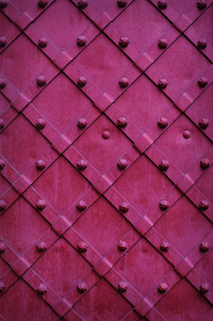 Texture chipped metals doors dark red color.の写真素材