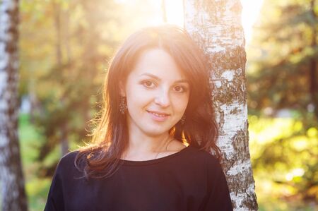 portrait of a beautiful woman in the sun.の写真素材