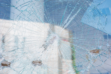 Bullet holes in the window of a shop in Dnepropetrovsk.の写真素材