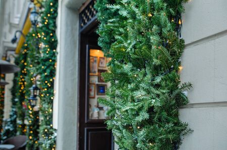 Open door with decorated Christmas tree.の写真素材
