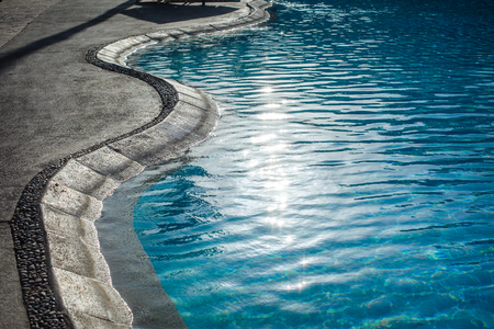 Swimming pool with at hotel close up.の写真素材