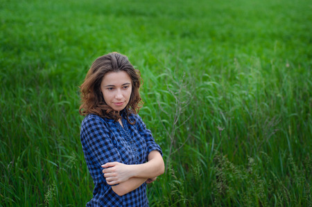 Beautiful girl in nature summer.の写真素材