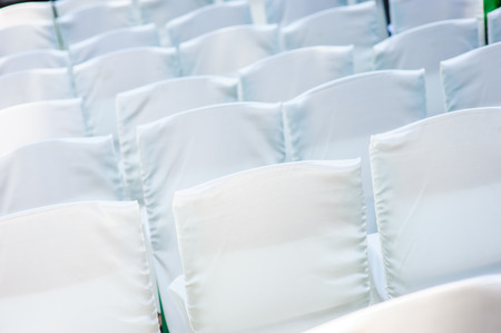 White wedding chairs for the ceremony.の写真素材