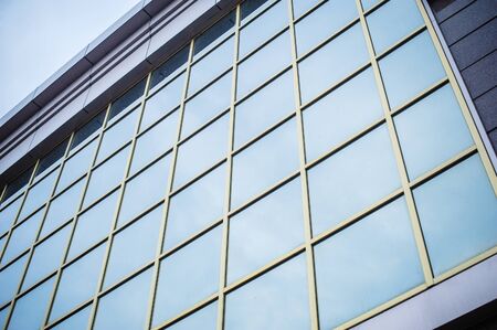 skyscraper against sky and building glass background.の写真素材