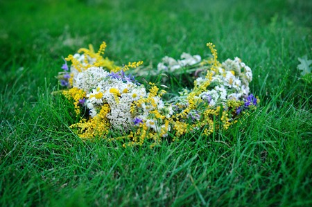 Beautiful bouquet of wild flowers on meadow outdoorsの写真素材