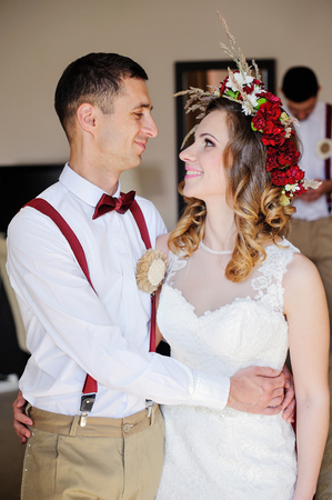 Bride and groom looking fondly of each other.の写真素材