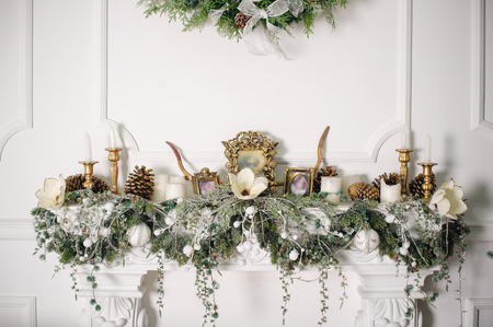 fireplace decorated with Christmas decorations.の写真素材