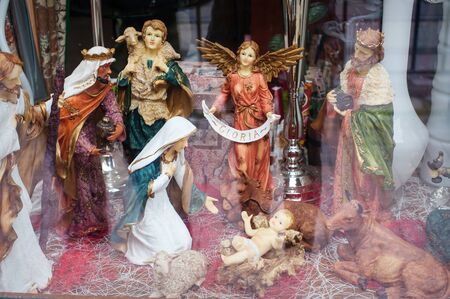 Christmas composition of the birth of Jesus in the shop window.