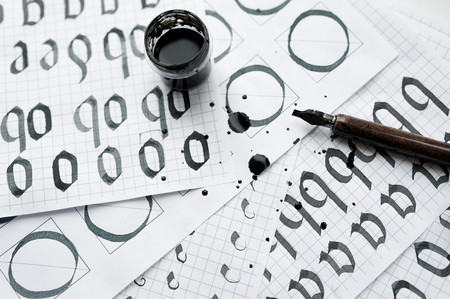 learning calligraphy - paper with example and brush and ink.