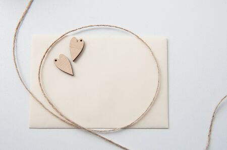 Valentines card with wooden heart and place for text.