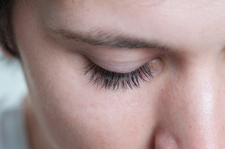 Macro shot of a male model eye lashes.の写真素材