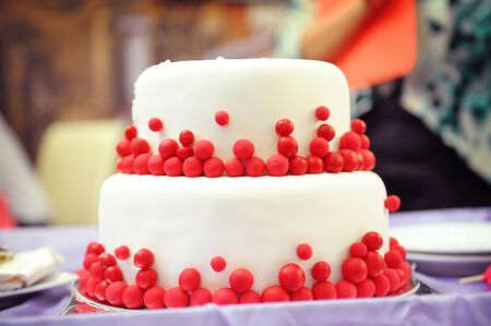 two-tier wedding cake, decorated in the style of Marsala.