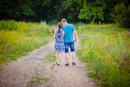 Couple in love strolling together in a beautiful parkの写真素材