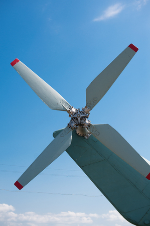Old airplane with propeller at the airfield.の写真素材