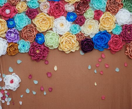 decorative background of multicolored paper colors and text.