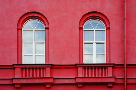 part of the multistory red houses with Windows and balconyの写真素材