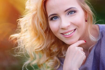 beautiful blond woman close-up with make-upの写真素材