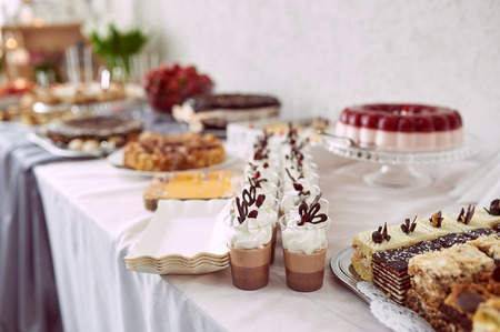 Buffet table with sweets at the wedding banquetの写真素材
