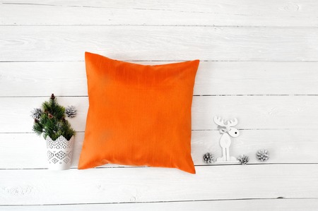 Orange Pillow case Mockup. Flat lay, top view photo mockup. Holidays decorationsの写真素材