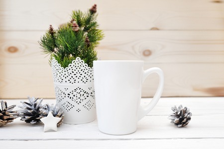 Christmas mock up styled stock product image white cup, Christmas scene with a white blank coffee mug that you can overlay your custom designの写真素材