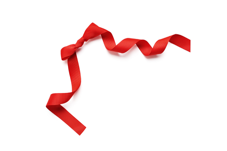 close up of a red ribbon bow isolated clipping mask on white background, top viewの写真素材