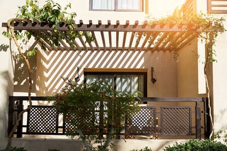 Sharm El Sheikh, Egypt - February 9, 2019: balcony facade of two-storey hotel building in the Arabic style. Tourist resort near the Red Sea. Summer vacation conceptのeditorial素材
