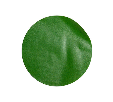 Crumpled green round sticker paper blank cutout with transparent background, creating a textured and vibrant visual elementの写真素材